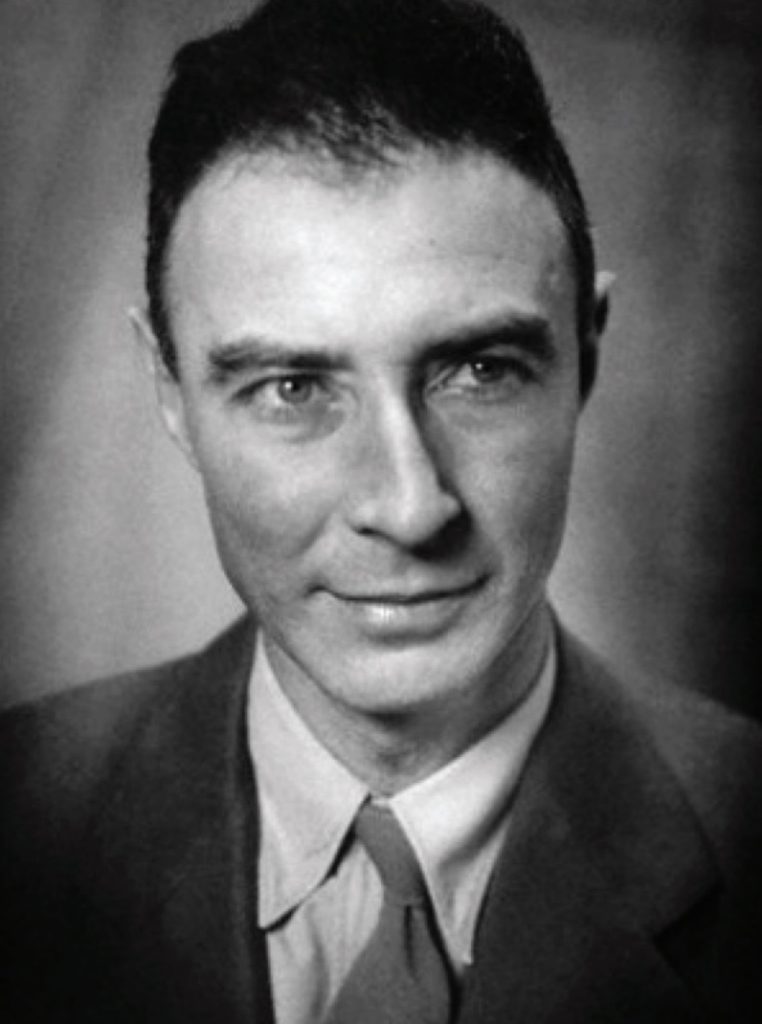 Black and white photo of J. Robert Oppenheimer in suit and tie.