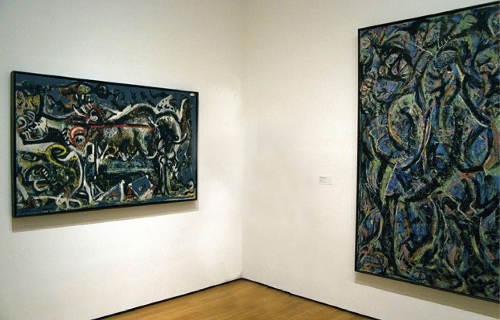 Photograph of Pollock works The She Wolf on left and Gothic on right