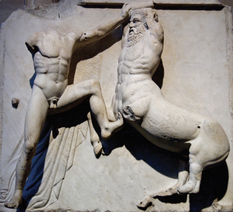 Sculpture of nude, headless and one-armed male fighting with legless centaur.