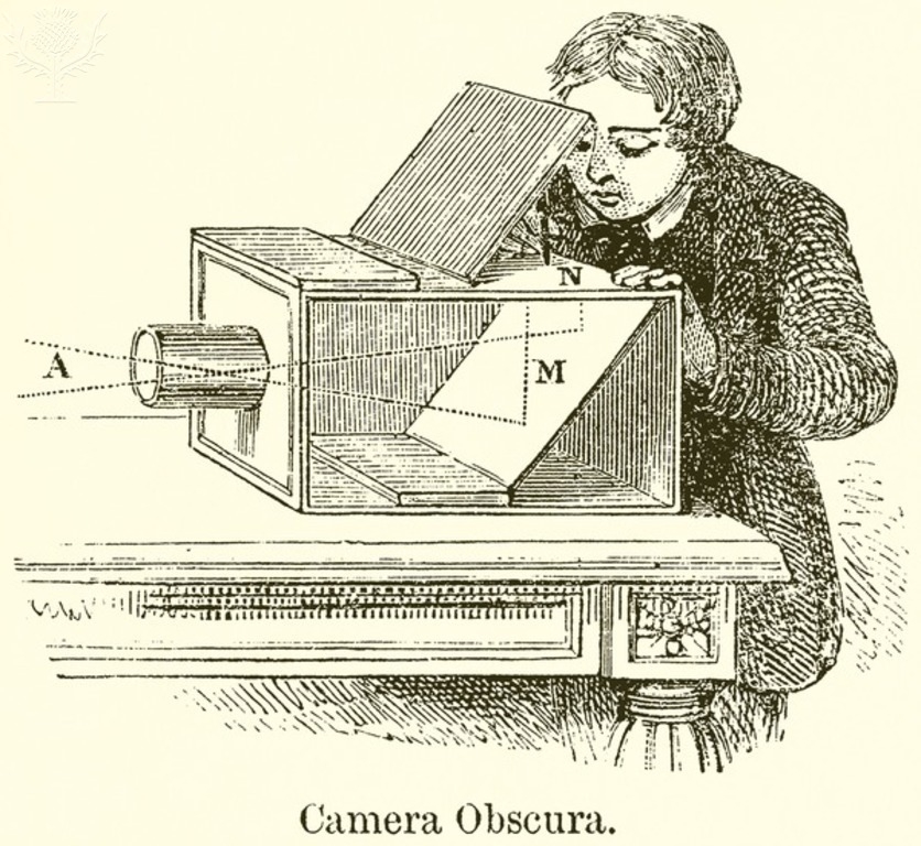 Man looking into a camera obscura and drawing.