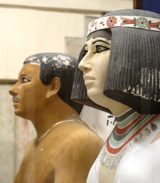Image of angled view of the faces of Prince Rahotep and his wife Nofret.