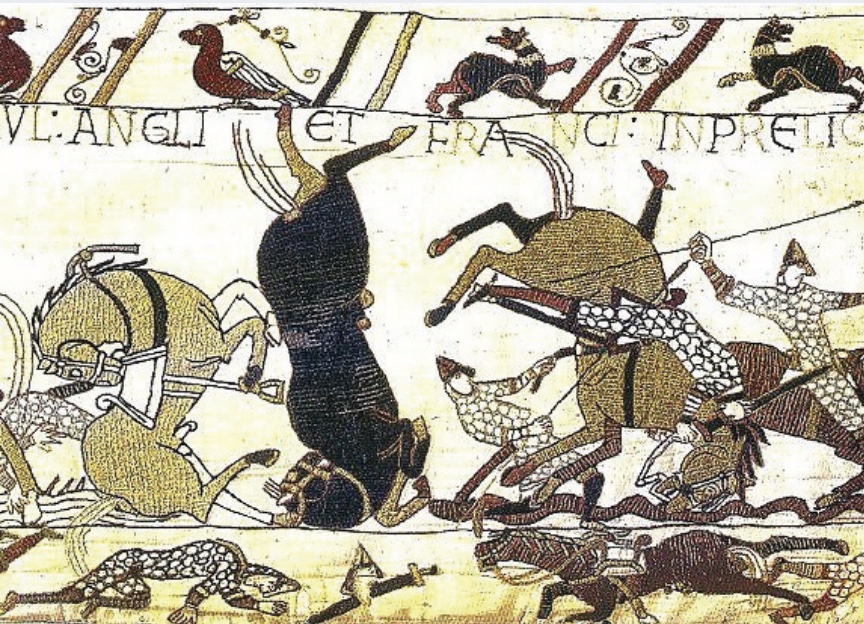 Tapestry depecting horses and riders upended in battle.