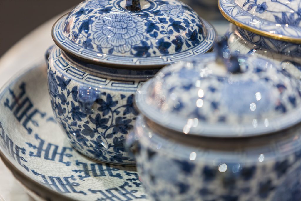 Chinese style porcelain pottery in blue color with selective focus.