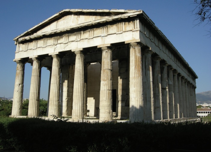 Photo of temple with large columns around entire perimeter.