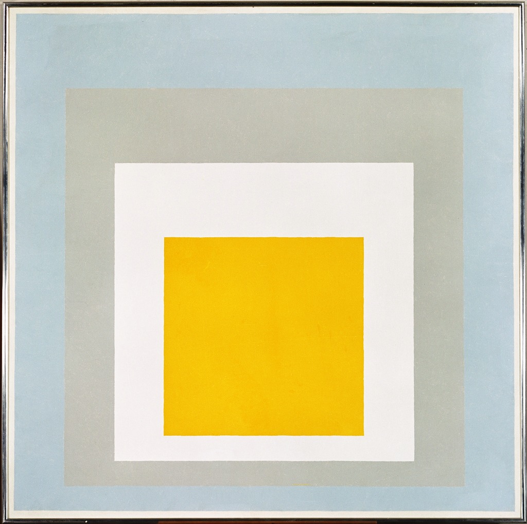 Painting showing four squares with a yellow square as the smallest, ascending into white, gray and finally a blue larger square. Oil on composition board.