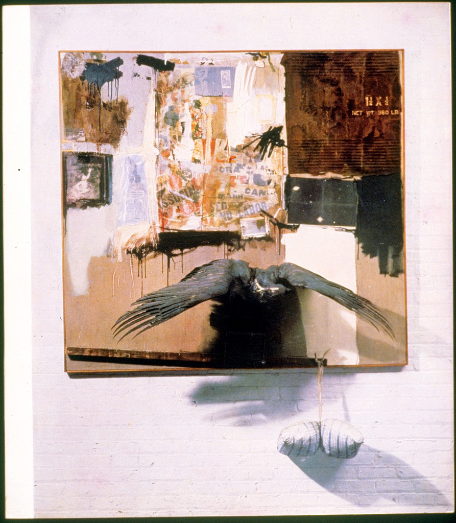 A painting mixed with sculpture, it features a taxidermied eagle, a pillow, and other elements.