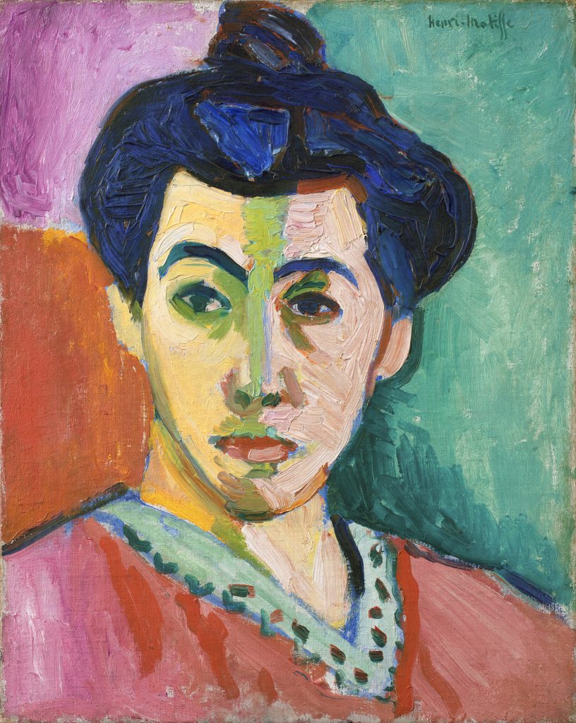 Image of Portrait of Madame Matisse; La Raie Verte (The Green Line) by Henri Matisse. Shown is a portrait of Henri Matisse's' wife. Clearly shown is a green line that runs down her face giving the effect of shadow and light being cast on her face. Oil on canvas painting.