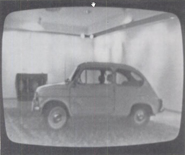Image of My First Car by Tom Marioni. Shown is a small old-fashioned car. Photograph in black and white.