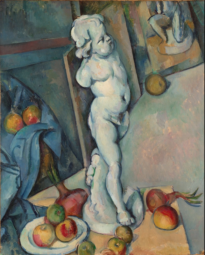 Image of Still Life with Plaster Cupid by Paul Cézanne. Shown is a still life of a plaster cupid sculpture with no arms surrounded by some fruits and beets. In the background some canvases are visible, (almost as in a studio).