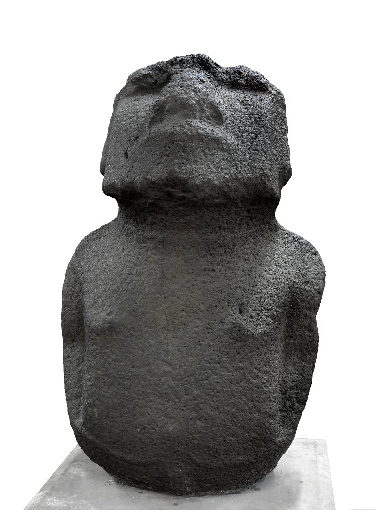 A photo of Moai Hava, a weather/time worn statue with much of the top of his head missing.