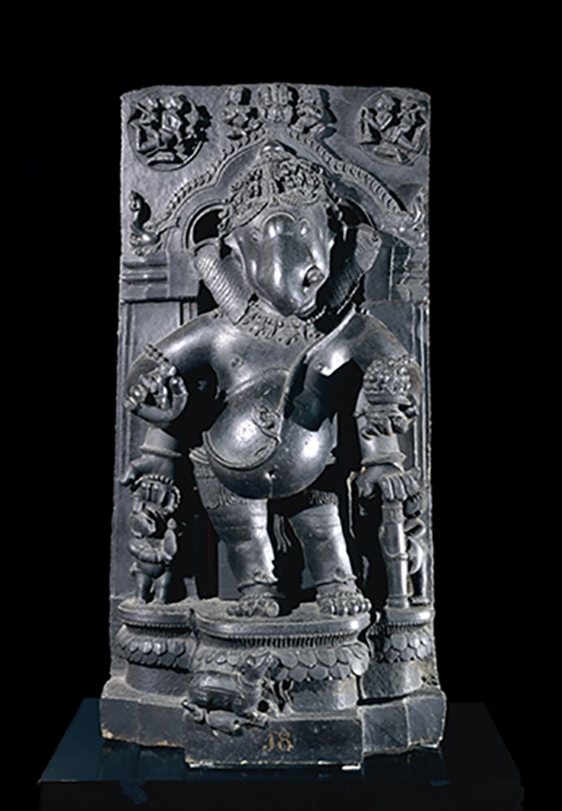 Photo of sculpted elephant standing within an arch; Figure of Genesa.