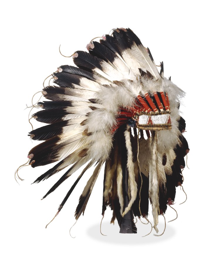 An elaborate native headdress of black and white feathers with red wrapped ends.