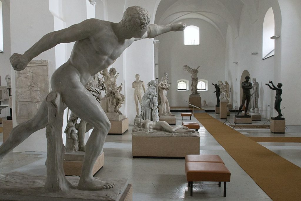 A room filled with plaster casts of many different sculptures.