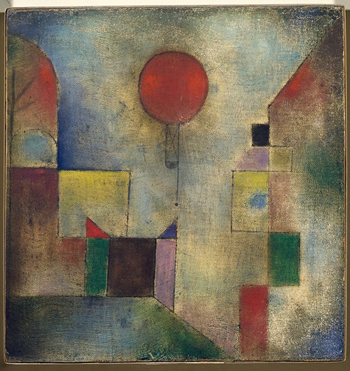 Painting of a red hot air balloon surrounded by colorful geometric shapes.