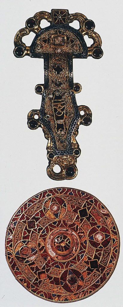 Frankish fibulae, looped fibula, silver gilt worked in filigree, with inlays of garnets and other stones.