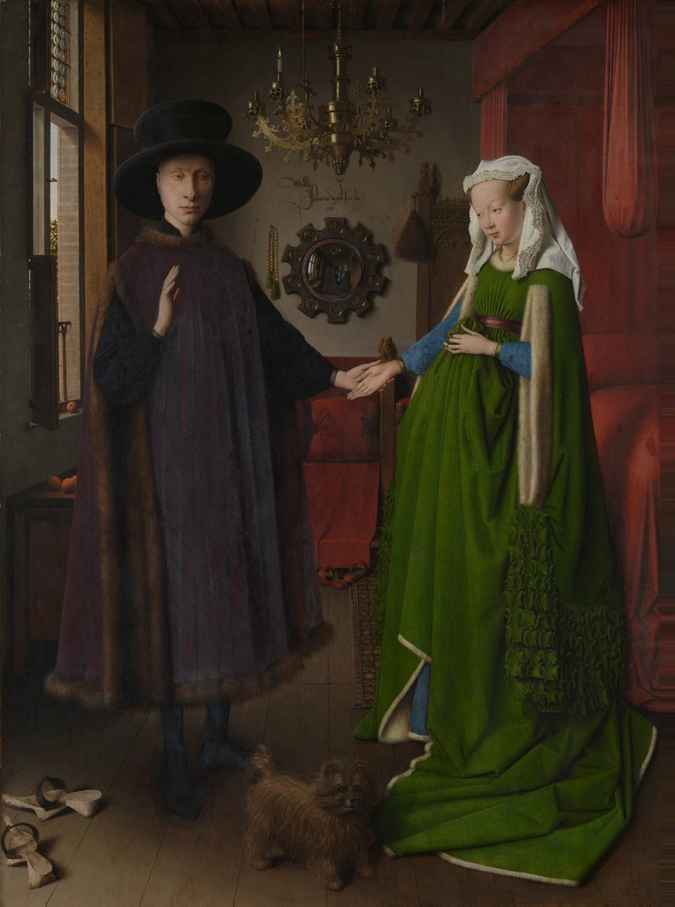 Image of The Arnolfini Portrait by Jan Van Eyck. This work is a portrait of Giovanni di Nicolao Arnolfini (left) and his wife (right), but is not intended as a record of their wedding. His wife is not pregnant, as is often thought, but holding up her full-skirted dress in the contemporary fashion.