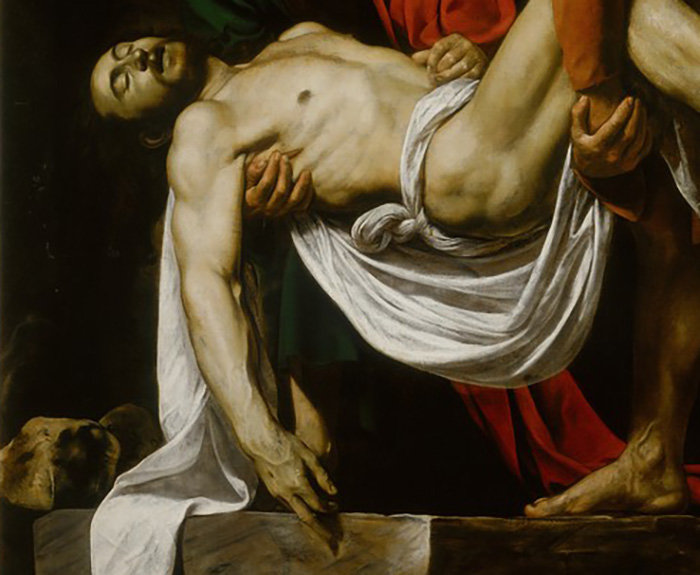 Detail view of Deposition showing Christ's torso, drape, and arm.