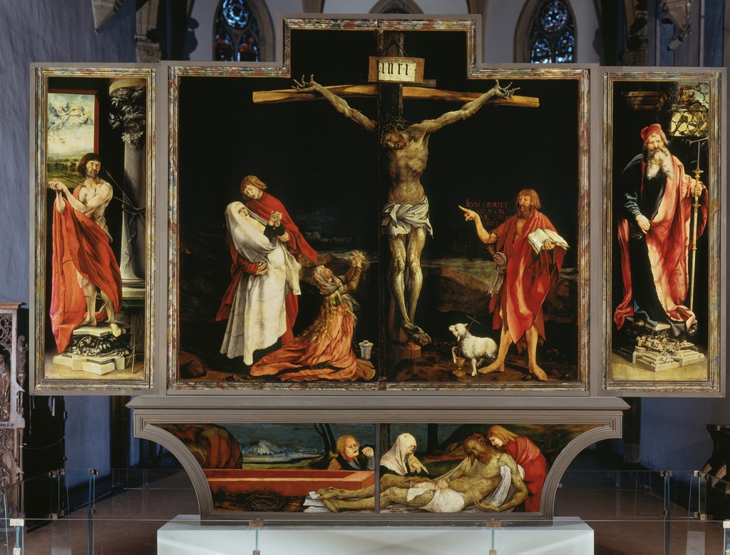 Alterpiece showing Jesus Christ on the cross surrounded by onlookers.