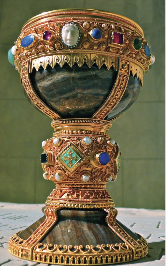 Photo of an ornately decorated chalice in gold and jewels.