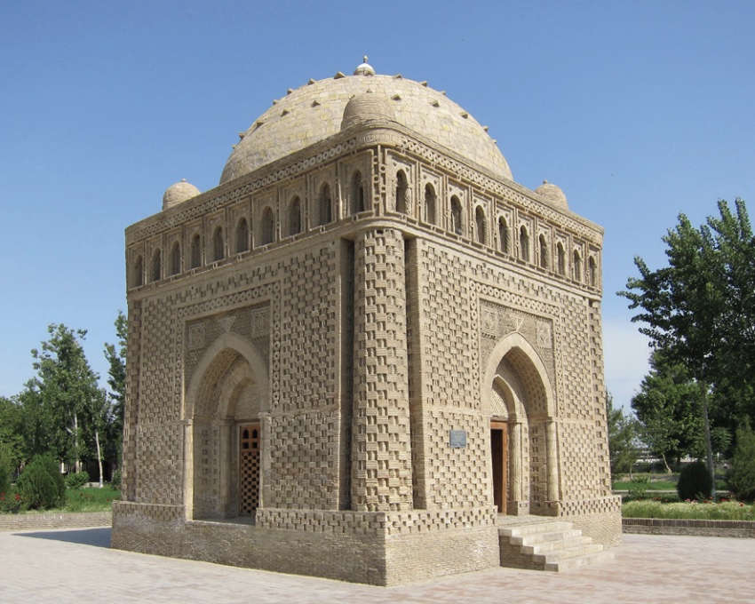 Photo of a large square stone building with dome top.
