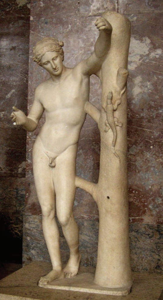 Photo of sculpture of nude male leaning against a tree.