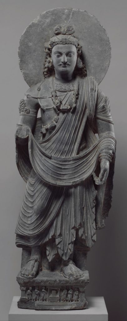 Photo of statue of a bodhisattva in traditional dress.